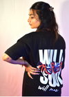 Black oversized t shirt with tiger eyes graphic and bold text “Wild Soul will never die” – streetwear fashion graphic tee for men and women.